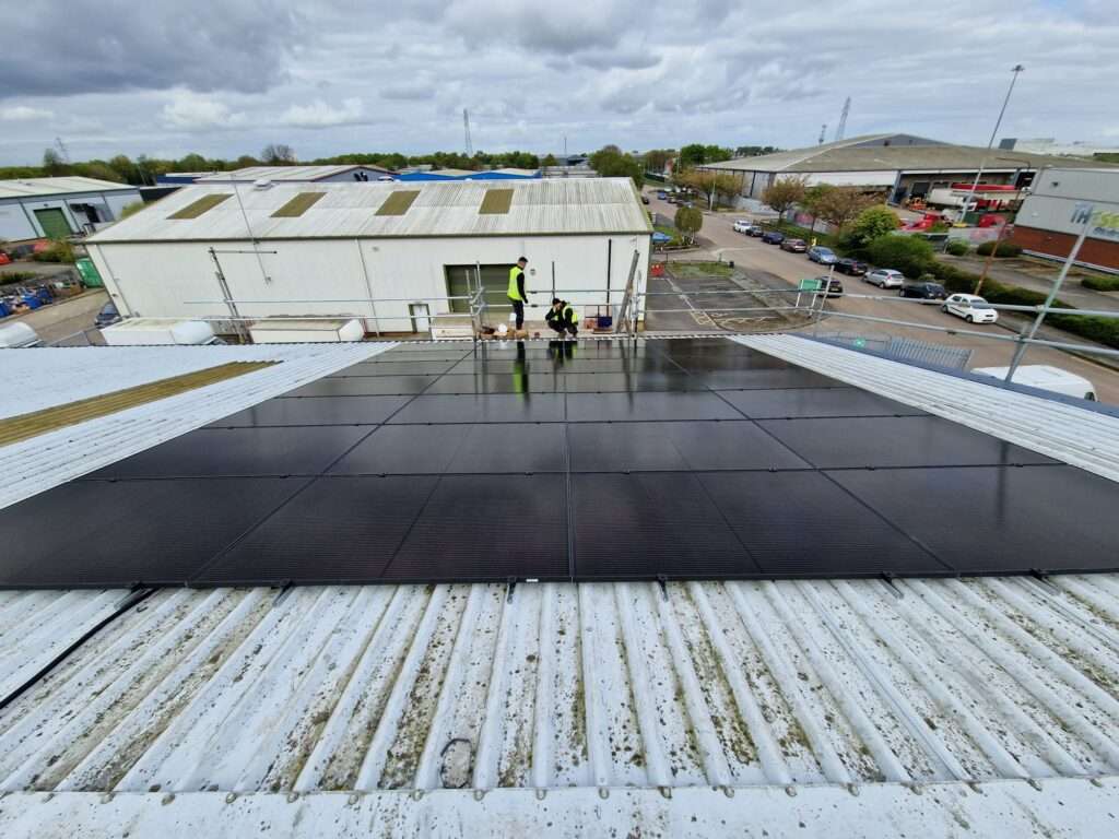 Completed rooftop solar panel installation on commercial building