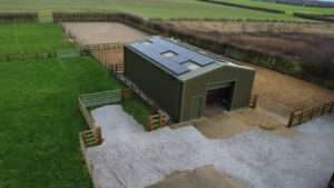 Solar PV panels installed across barn roof