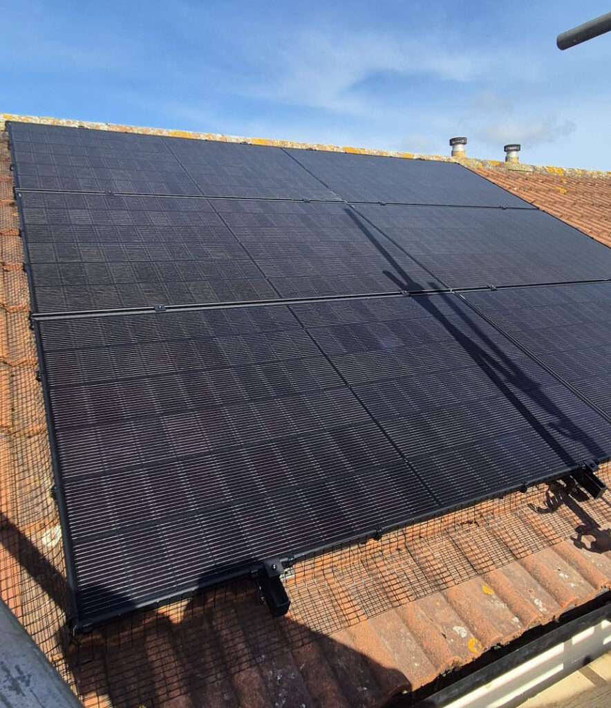 Six solar panels installed on a residential roof